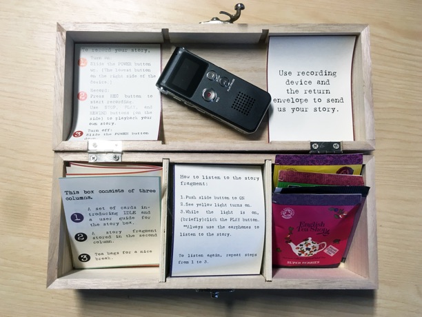 Storytelling box including its instructions, playback device and recorder, as well as a selection of teas.